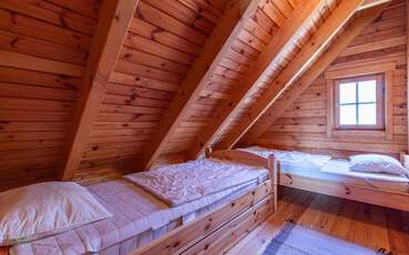 Schlafzimmer mit zwei Einzelbetten Ferienhaus Slingsö
