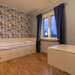 Schlafzimmer mit ausziehbaren Doppelbett Ferienhaus Småland