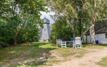 Garten mit Blick auf die Mühle Ferienhaus Södra Kvarn