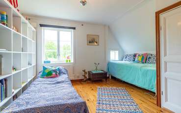 Schlafzimmer mit zwei Einzelbetten Ferienhaus Solvalla