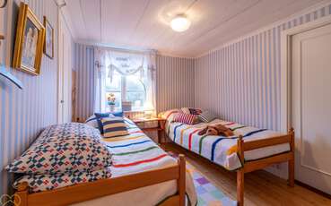 Schlafzimmer mit zwei Einzelbetten Ferienhaus Staby