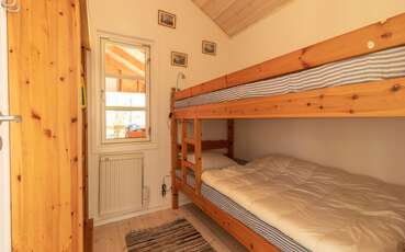 Schlafzimmer mit Etagenbett Ferienhaus Stensjö