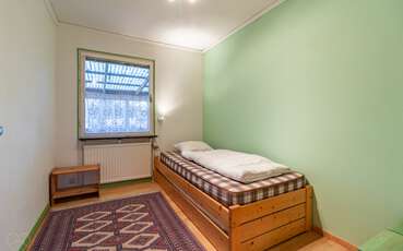 Schlafzimmer mit Ausziehbett Ferienhaus Stora Ryd