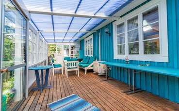 Großer Wintergarten Ferienhaus Studio