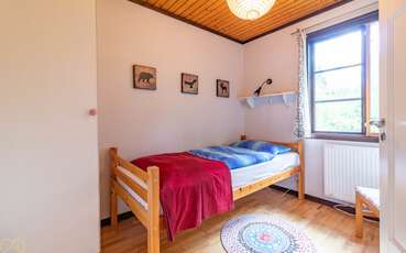 Schlafzimmer mit Einzelbetten Ferienhaus Tallstuga