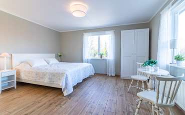 Schlafzimmer mit Doppelbett Ferienhaus Tilda