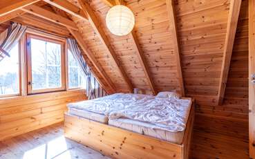 Schlafzimmer mit Doppelbett Ferienhaus Toven