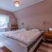 Schlafzimmer mit Doppelbett Ferienhaus Tving
