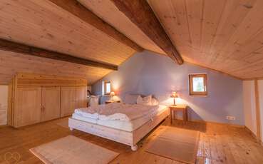 Schlafzimmer mit Doppelbett Ferienhaus Vedamåla