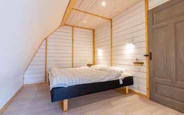 Schlafbereich mit Doppelbett Ferienwohnung Veden