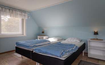 Schlafzimmer mit zwei Einzelbetten Villa Solbacka
