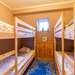 Schlafzimmer mit zwei Etagenbetten Ferienhaus Villa Vegby