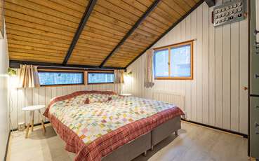 Schlafzimmer mit Doppelbett Ferienhaus Vimmern