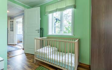 Babybett Ferienhaus Vita Stugan