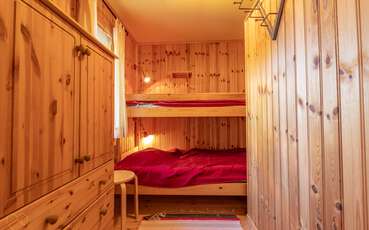 Schlafzimmer mit Etagenbett Ferienhaus Waldblick